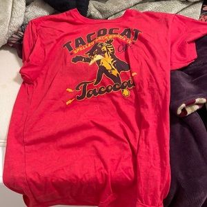 This is from Chuy’s which is a restaurant in Oklahoma and is red and a medium.